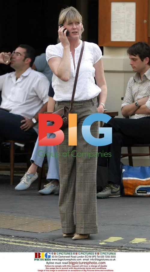 Sarah Lancashire Hailing Taxi in London
