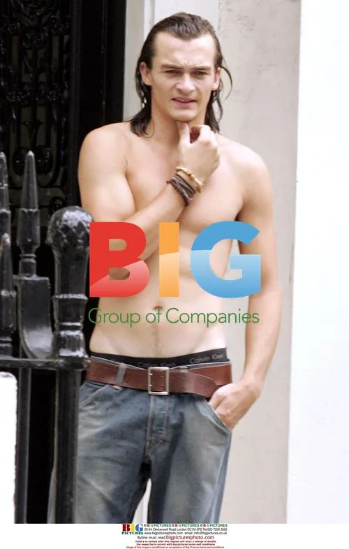 Rupert Friend Waits for Delivery in London
