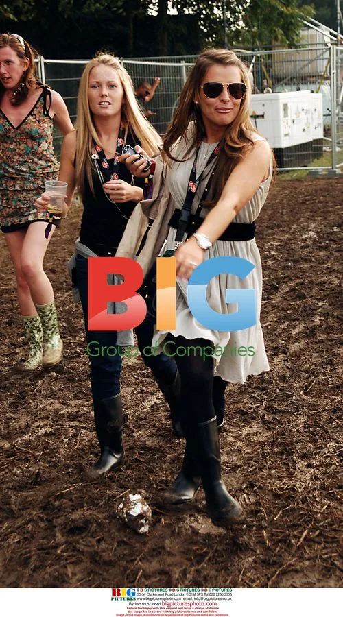 Coleen McLoughlin slips on mud at V Festival 2006
