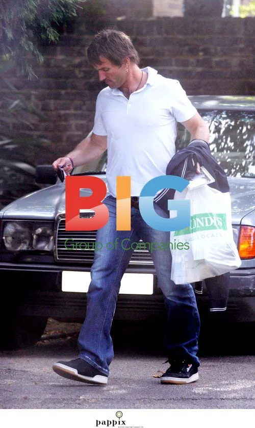 Pat Cash Leaves Car After Shopping