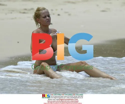 Gorgeous Glamour Model Malene Topless Swim