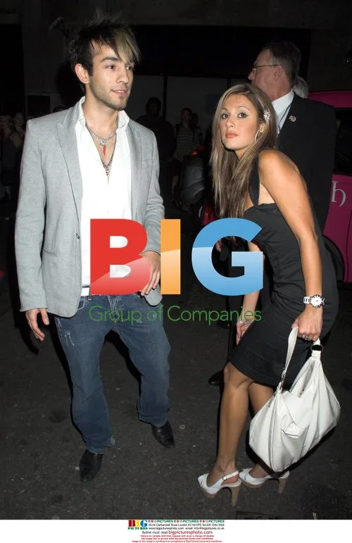 Sezer and Guest at 'You, Me and Dupree' Premiere Party