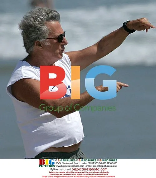 Dustin Hoffman Takes Dogs for Walk