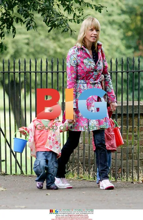 Sarah Cox and kids walking in park