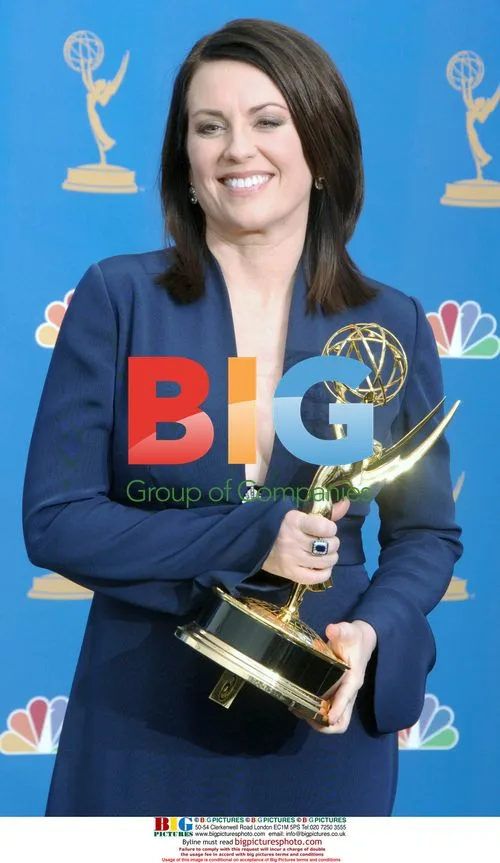 Megan Mullallay holds Emmy for 'Will & Grace'