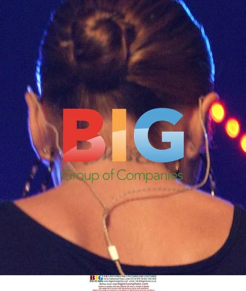 Cheryl Tweedy-Cole of Girls Aloud on stage