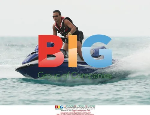 Tina O'Brien and Ryan Thomas on jetski in Antigua