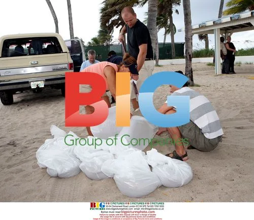 Residents Fill Sandbags Before Hurricane Ernesto