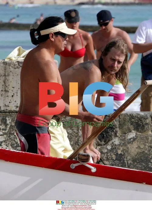 Kid Rock parties in Hawaii with pals