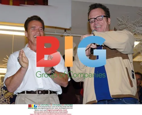 Arnold Schwarzenegger and Tom Arnold at charity event