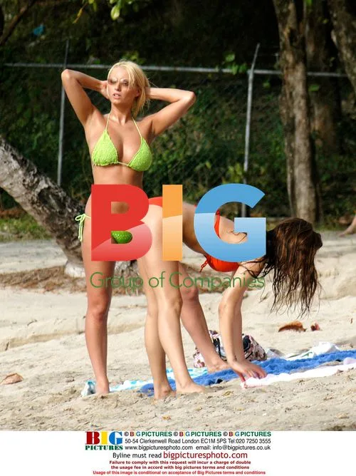 Glamour models on beach in Barbados