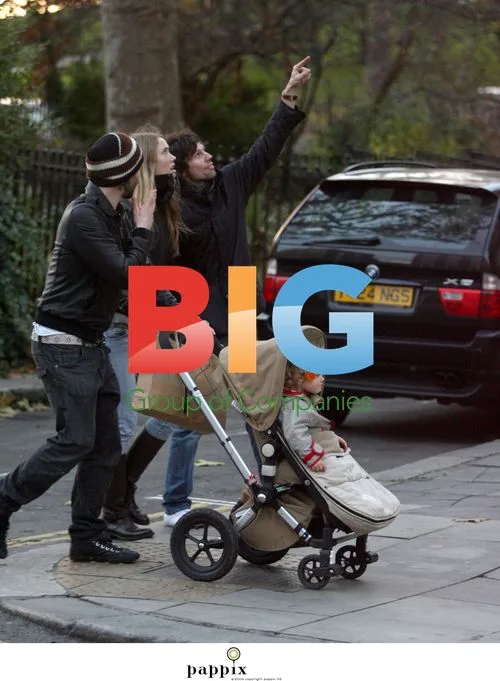 Take That Stars Jason Orange and Howard Donald Take Family Walk