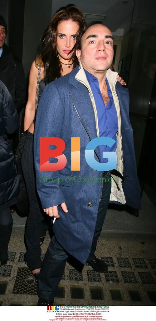 Sophie Anderton leans on a Danny DeVito lookalike