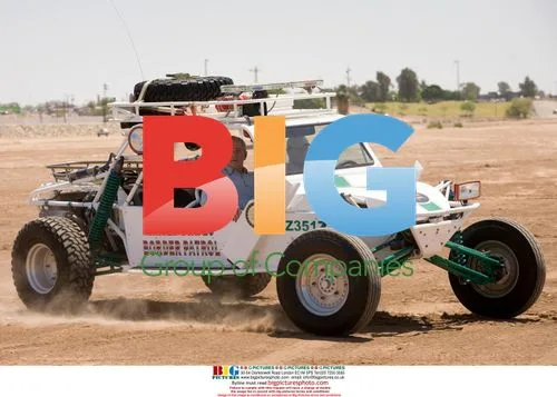 Bush Rides 'Sand Rail' Near Border