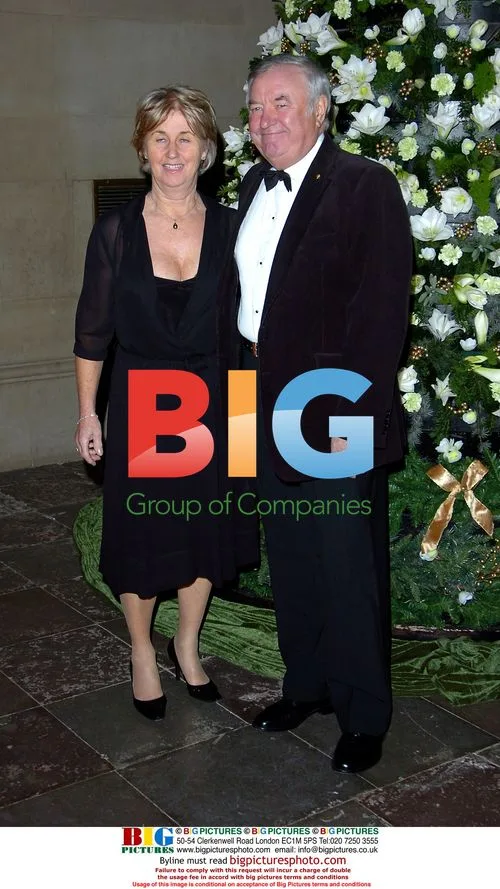 Jimmy Tarbuck and wife at Cliff Richard's Christmas celebration