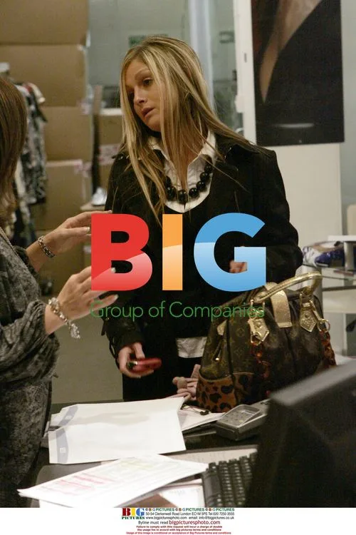 Nikki Grahame shops at Lipsy in London