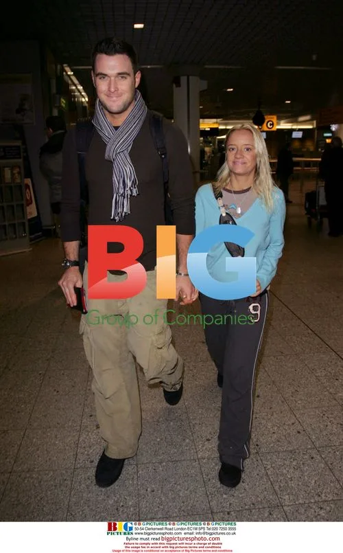 Newly wed Lucy Davis and Owain Yeoman leave Heathrow