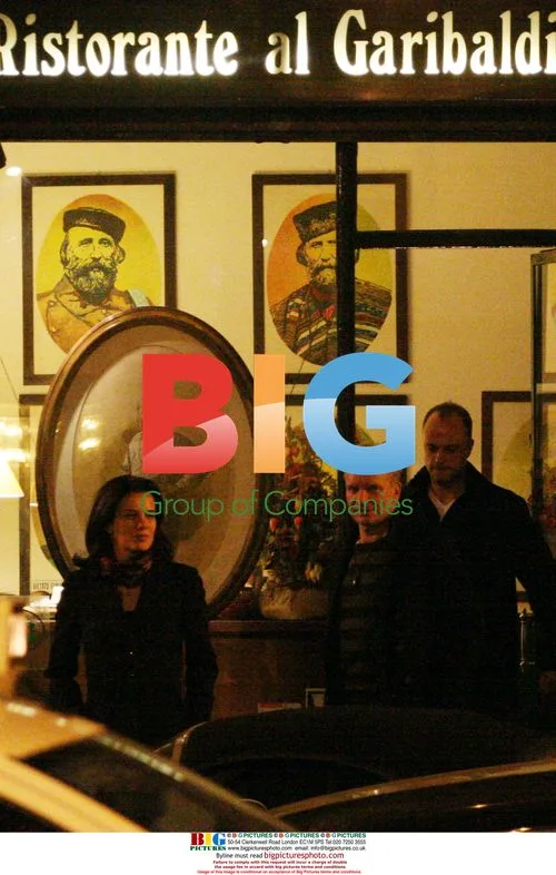 Sting Leaving Restaurant with Mystery Woman