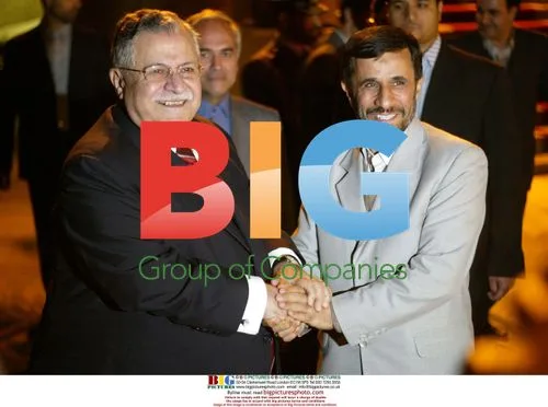 Talabani and Ahmadinejad Handshake