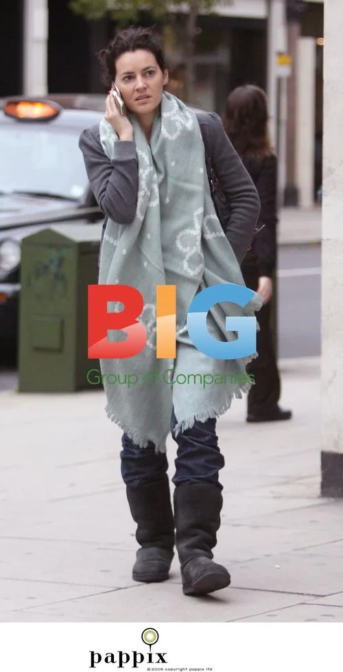 Actress Louise Delamere chats on phone in London