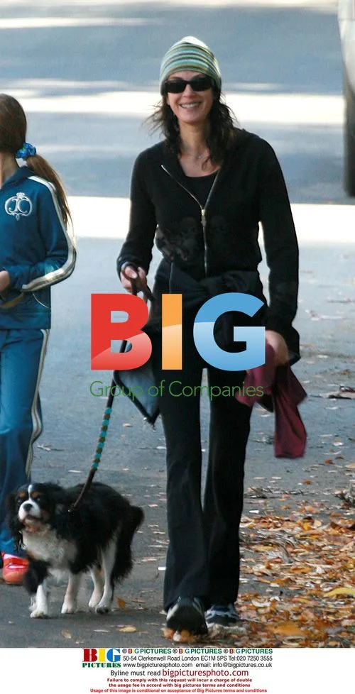 Teri Hatcher and Daughter Walking Dogs