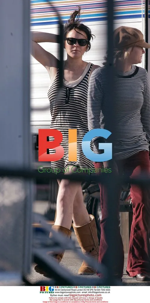 Lindsay Lohan's mini-skirt almost blows up on set