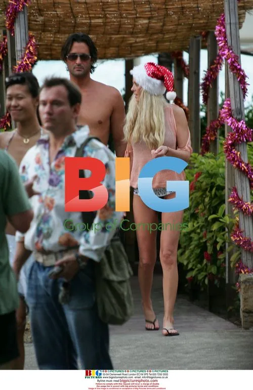 Tara Reid Plays Santa in Bikini