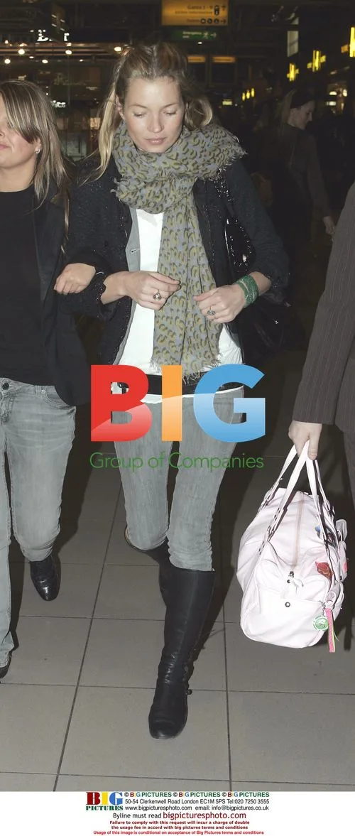 Kate Moss Departs Heathrow for Holiday