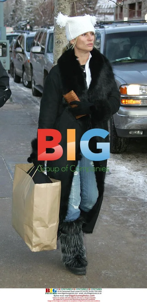 Nicollette Sheridan and Michael Bolton Christmas shopping in Aspen