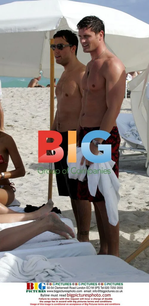 Lance Bass and Reichen Lehmkuhl swim together