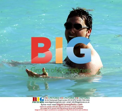 Lance Bass and Reichen Lehmkuhl swim together
