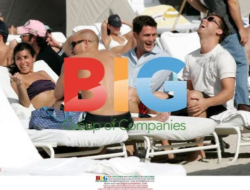 Lance Bass, Reichen Lehmkuhl, and Jamie-Lynn Sigler swimming
