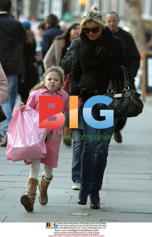 Tina Hobley and Oliver Wheeler out with daughter