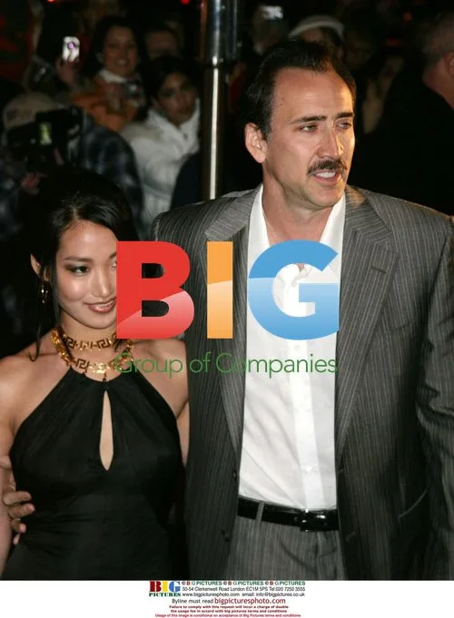 Nicolas Cage and Alice Kim at Versace Boutique