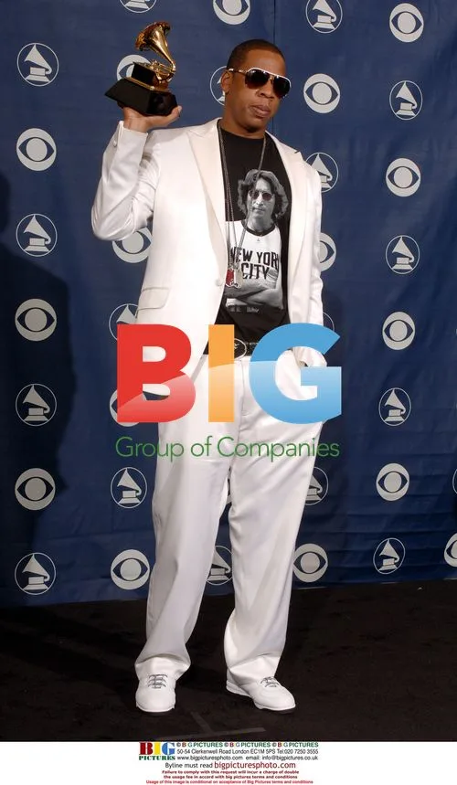 Jay-Z Holds Grammy Award at 48th Annual Grammys