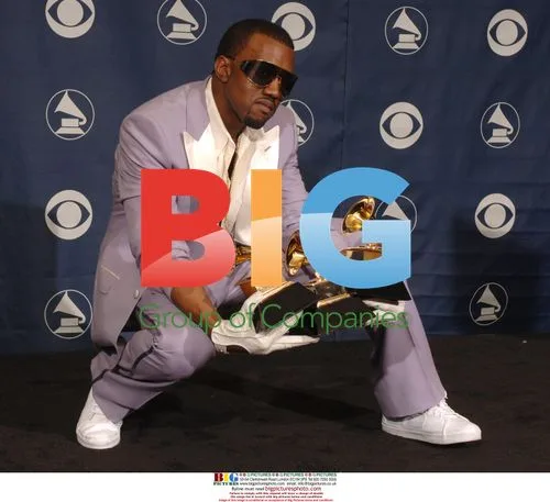 Kayne West Holds 3 Grammy Awards