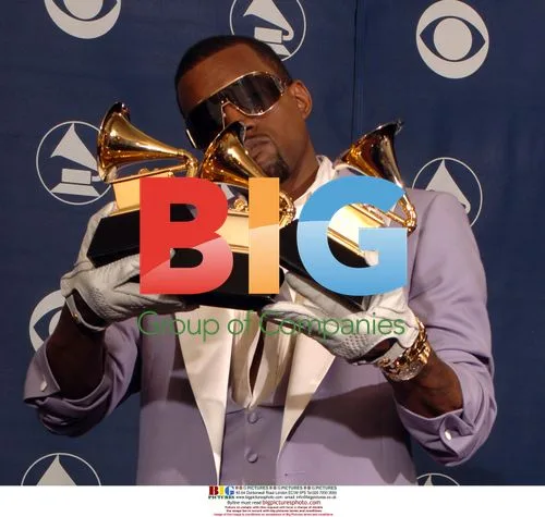 Kayne West Holds 3 Grammy Awards