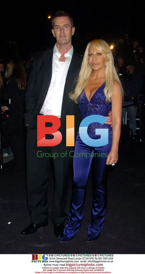 Rupert Everett and Donatella Versace at Versace Fifth Ave Reopening