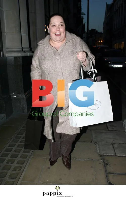 TV Presenter Lisa Riley Shopping at Prada