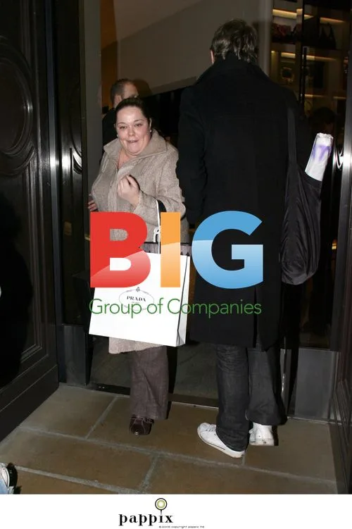 TV presenter Lisa Riley shopping at Prada
