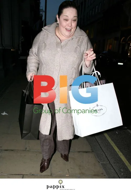 TV Presenter Lisa Riley Shopping at Prada