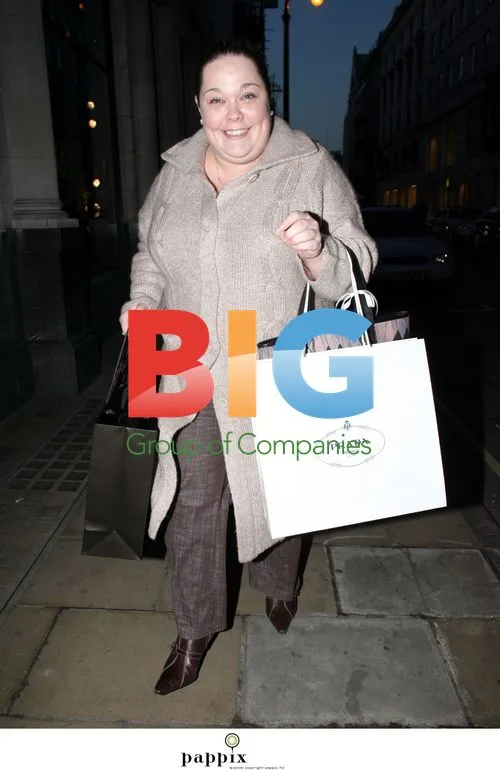 TV presenter Lisa Riley shopping at Prada