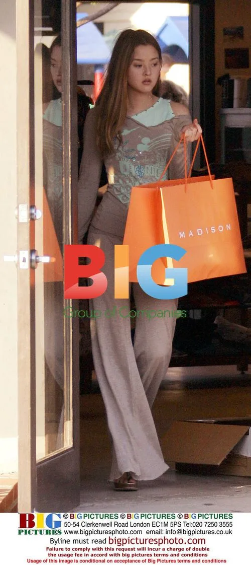Model Devon Aoki Shops in Malibu