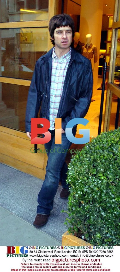 Noel Gallagher and Sara McDonald shopping at Burberry