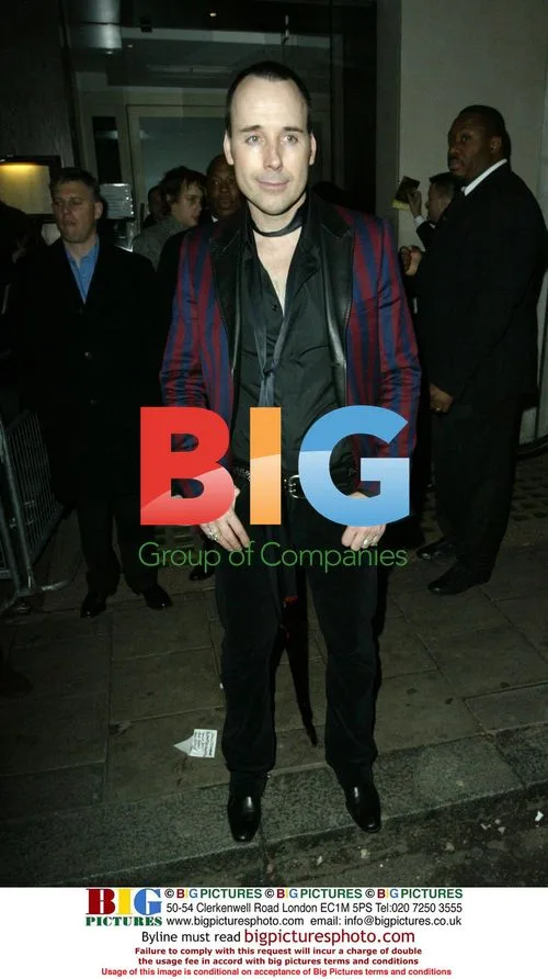 David Furnish leaving Brits 2006 after party