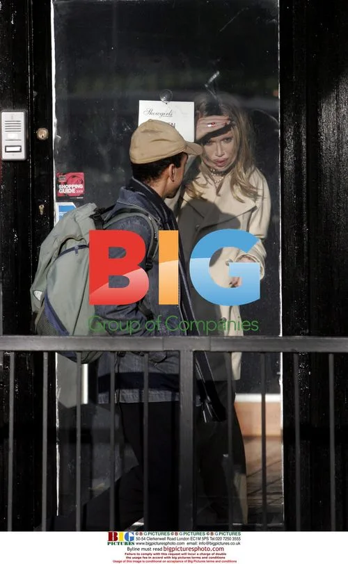 Pete Burns shops for rubber trousers