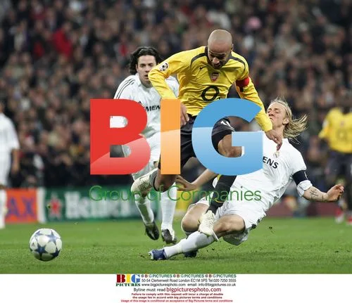 Arsenal's Thierry Henry scores against Real Madrid