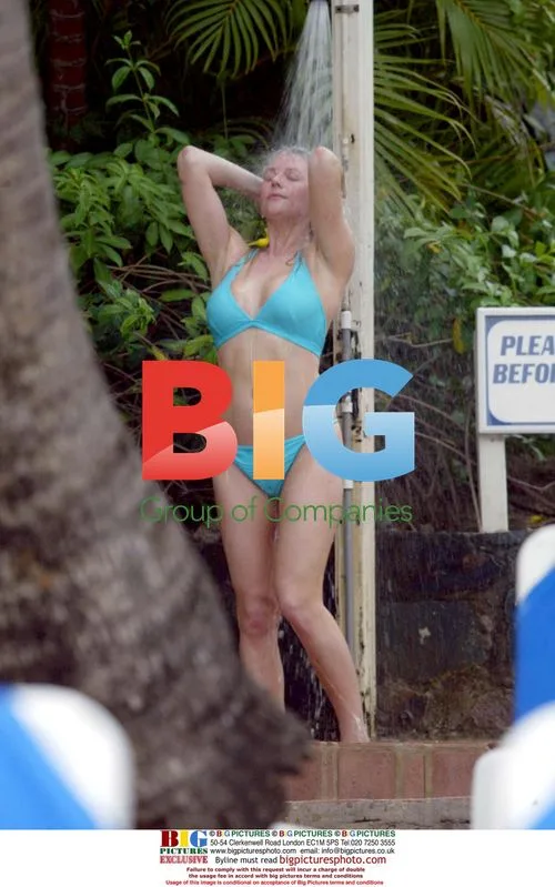 Abi Titmus plays with inflatable whale in Spain