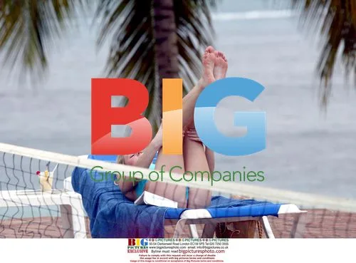 Abi Titmus plays with inflatable whale in Spain