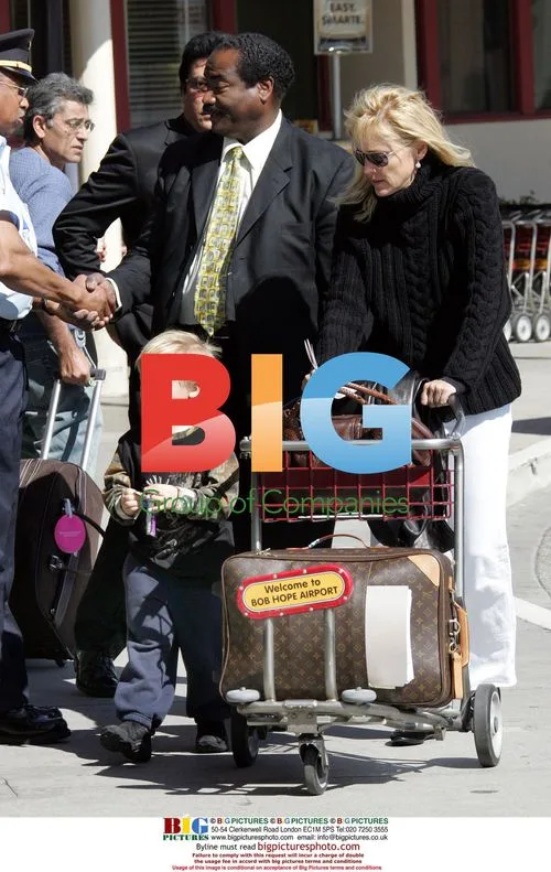 Sharon Stone and son Roan at airport